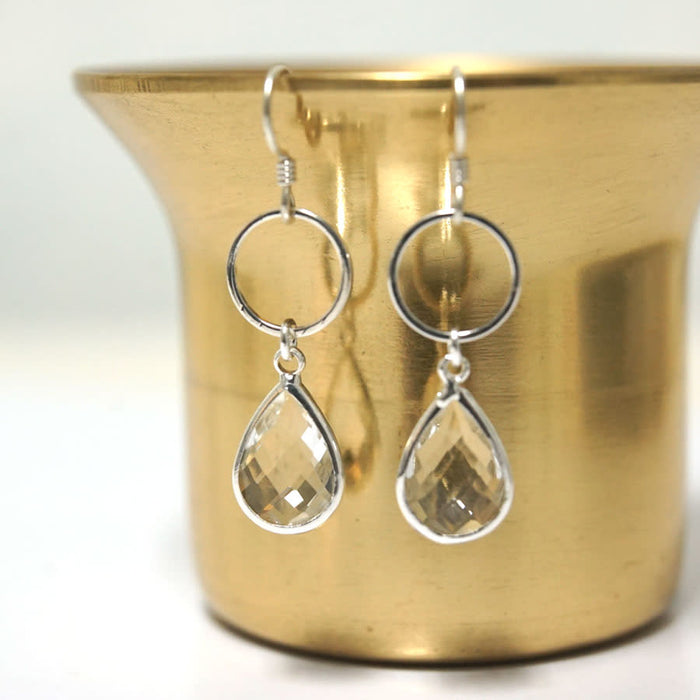 10x14mm Oval Clear Faceted Glass Charm with Silver Plating