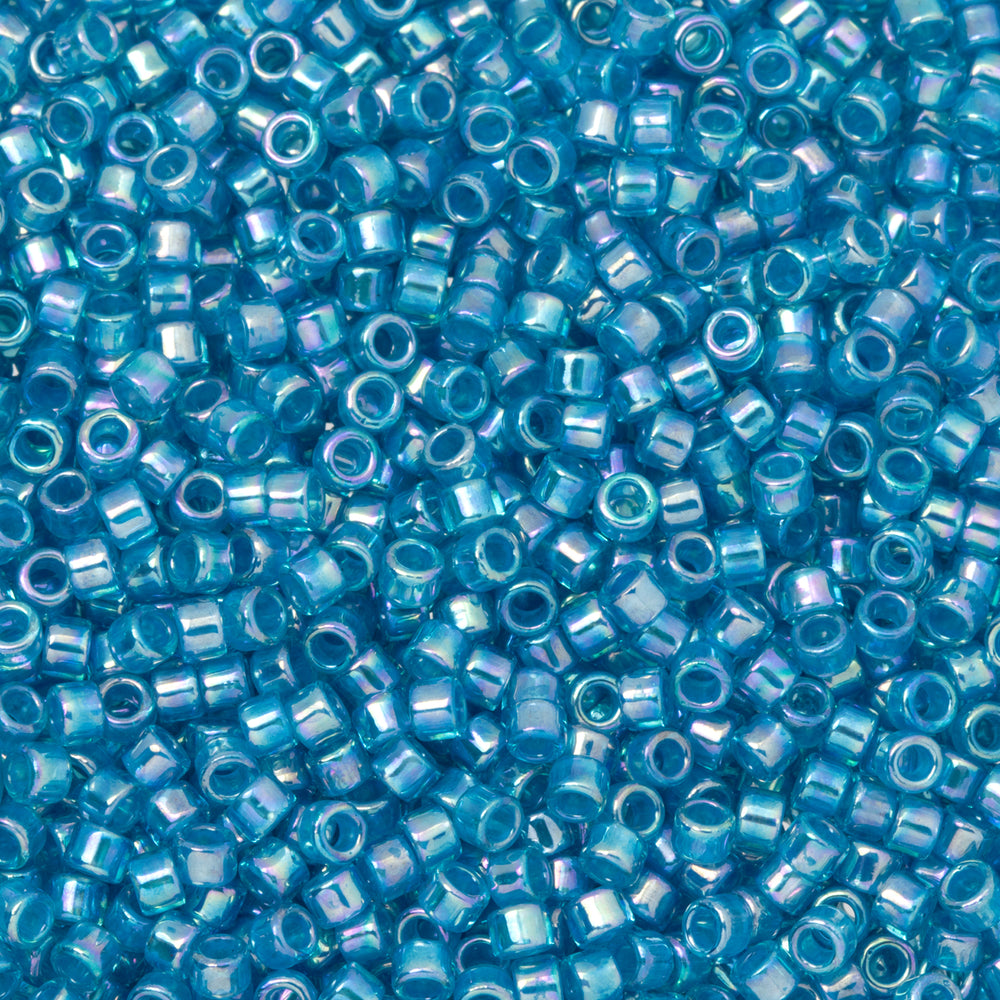 Toho Aiko Seed Beads, 11/0 #1835 'White-Lined Aqua Rainbow' (4 Grams)