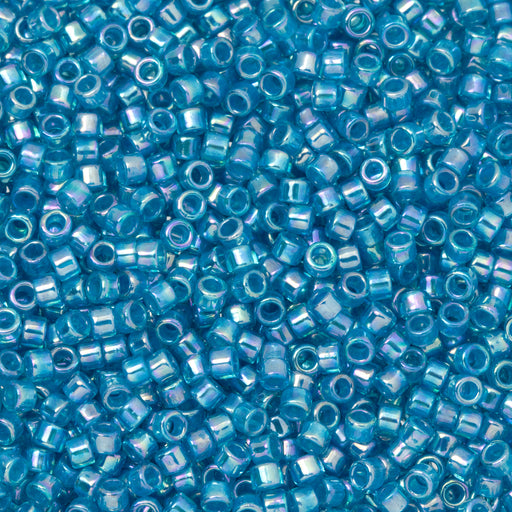 Toho Aiko Seed Beads, 11/0 #1835 'White-Lined Aqua Rainbow' (4 Grams)