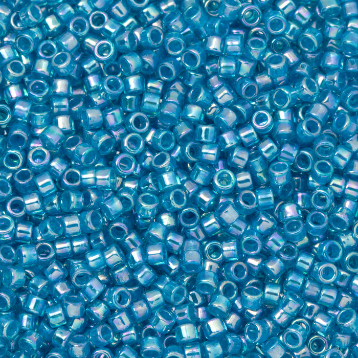Toho Aiko Seed Beads, 11/0 #1835 'White-Lined Aqua Rainbow' (4 Grams)