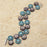 Retired - Aster Coin & Sepal Spiral Bracelet