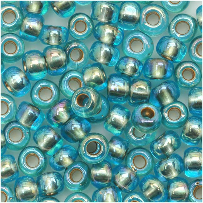 Toho Round Seed Beads 6/0 995 'Gold Lined Rainbow Aqua' 8 Gram Tube