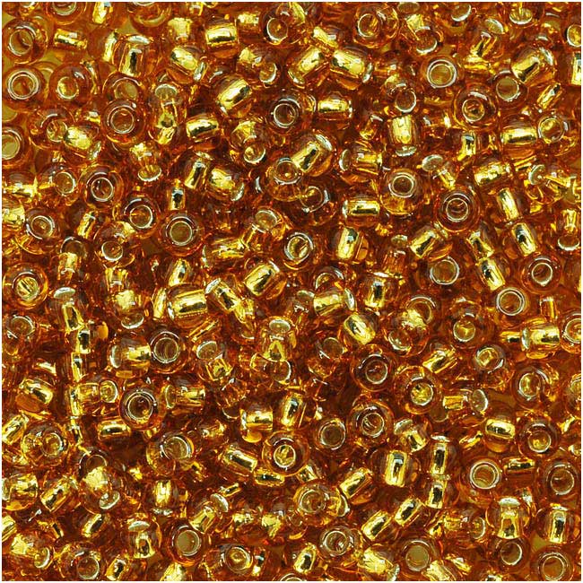 Toho Round Seed Beads 11/0 22C 'Silver Lined Topaz' 8 Gram Tube