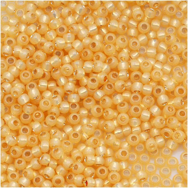 Toho Round Seed Beads 11/0 #2110 'Silver Lined Milky Light Topaz' 8g