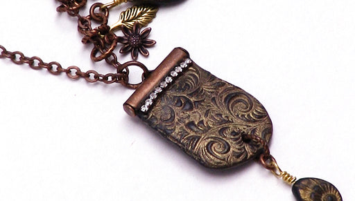 How to Create a Texturized Crystal Clay Stamping using a Ribbon End by Becky Nunn