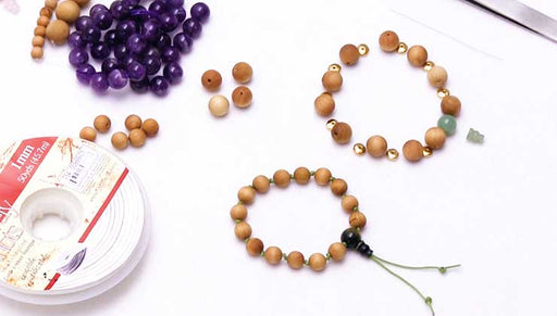 How to Make a Meditation Bracelet with Aromatic Wood Beads and a Gemstone Guru Bead
